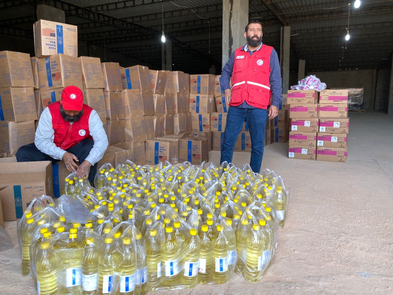 الهلال الأحمر بسرت يوزع 500 حصة غذائية على الأسر النازحة من السودان